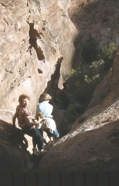 Petra10 Kathy McCormick and LJ McCarthy clambering over the rocks.